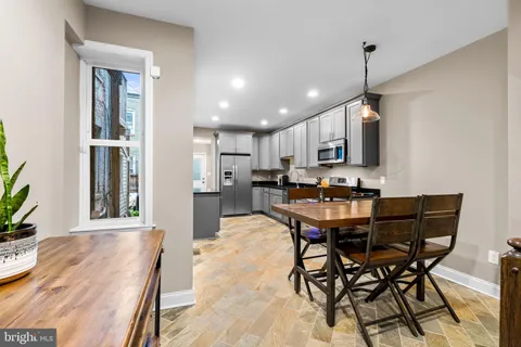 a view of a dining room with furniture