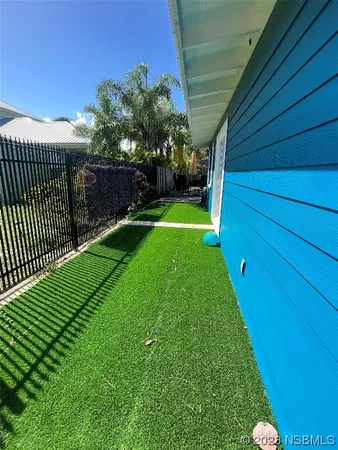 a view of a backyard with a garden