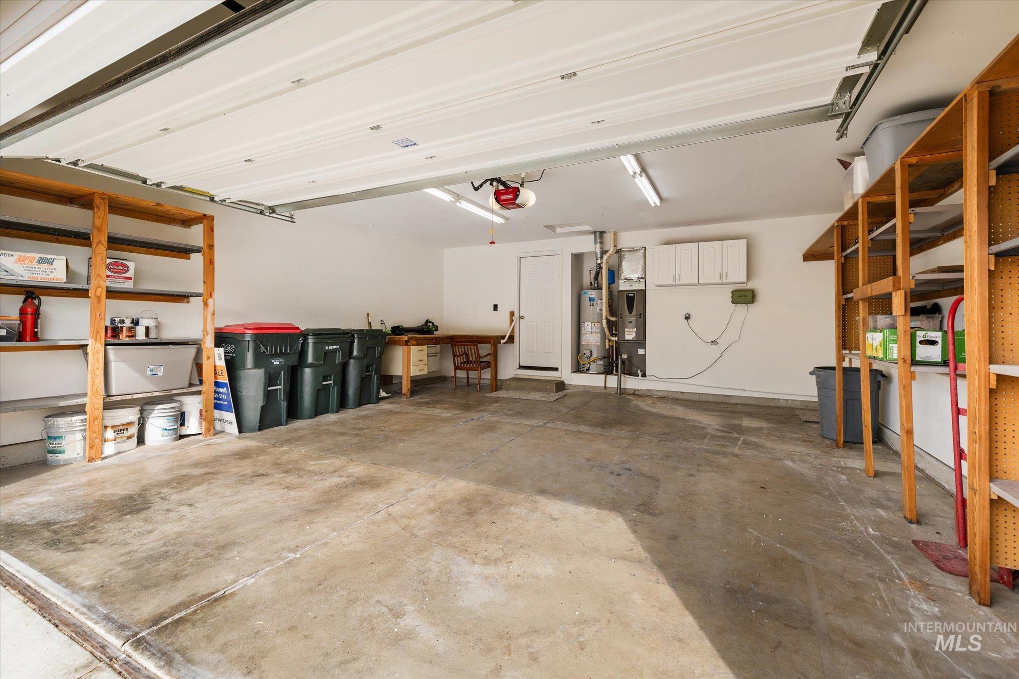 2250 North Amethyst Avenue Meridian, ID 83646 - Photo 49 of 50 Garage featuring water heater and heating unit