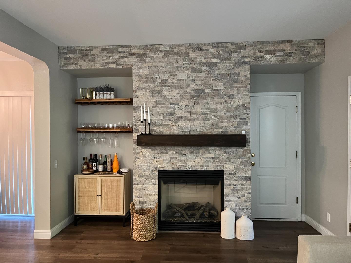 4184 Ivory Lane Turlock, CA 95382 - Photo 5 of 11 a room with a fireplace