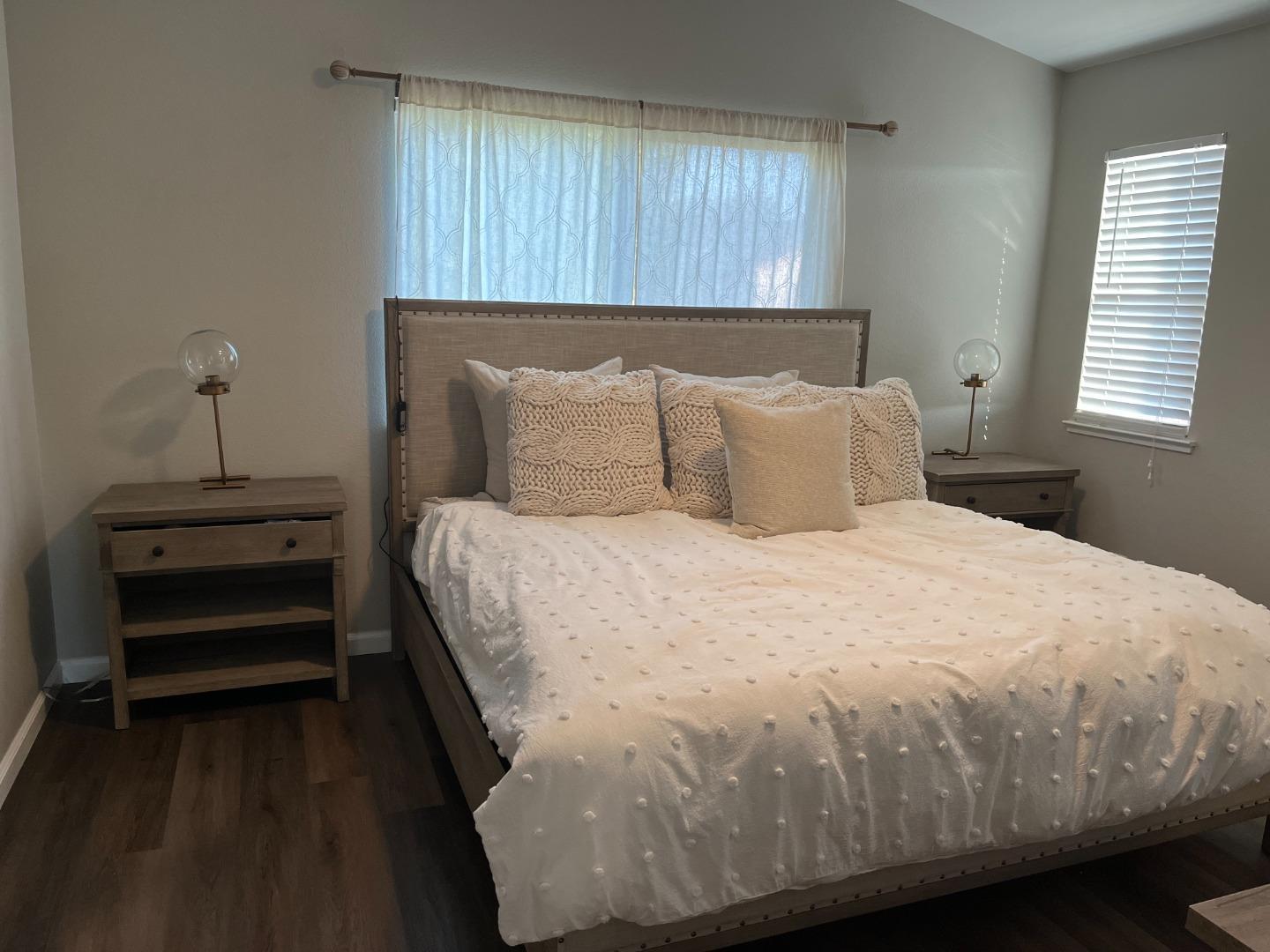 4184 Ivory Lane Turlock, CA 95382 - Photo 9 of 11 a bedroom with a bed and a window