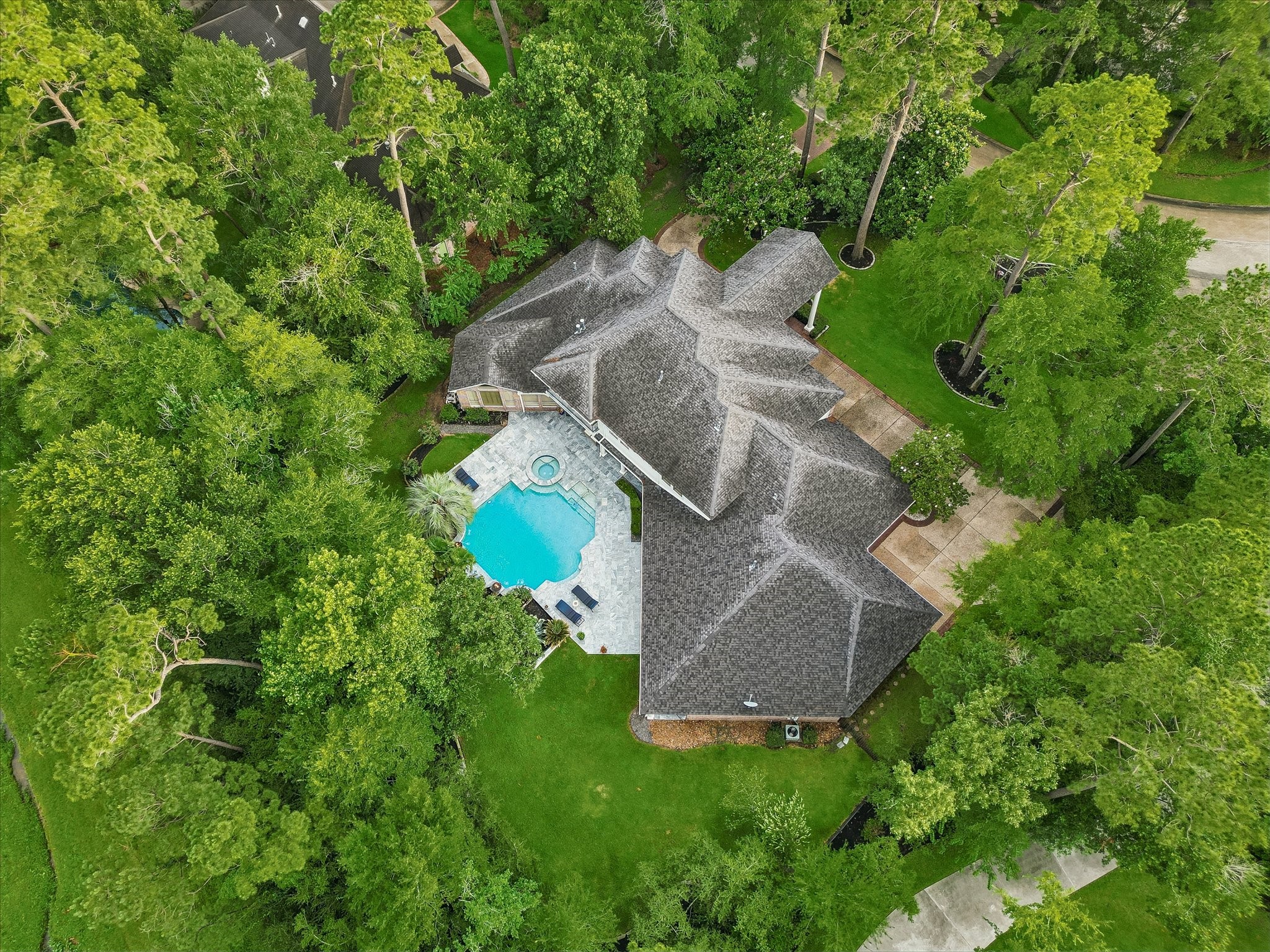 35 North Regent Oak Spring, TX 77381 - Photo 41 of 43 Aerial view highlighting the location of 35 N Regent Oak on the prestigious N Regent Oak street, ideally positioned just before the cul-de-sac on the right. This desirable setting offers privacy, limited through traffic, and an exceptional location within the highly sought-after Cochran’s Crossing community in The Woodlands.