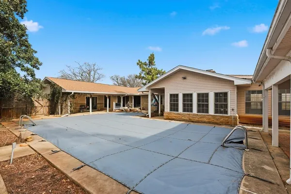 a view of house with outdoor space and street view