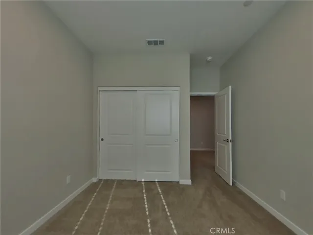 an empty room with closet