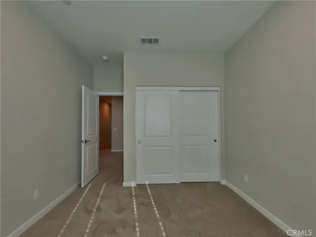 an empty room with closet