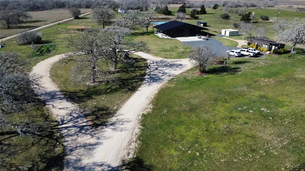 a view of a lake with a yard
