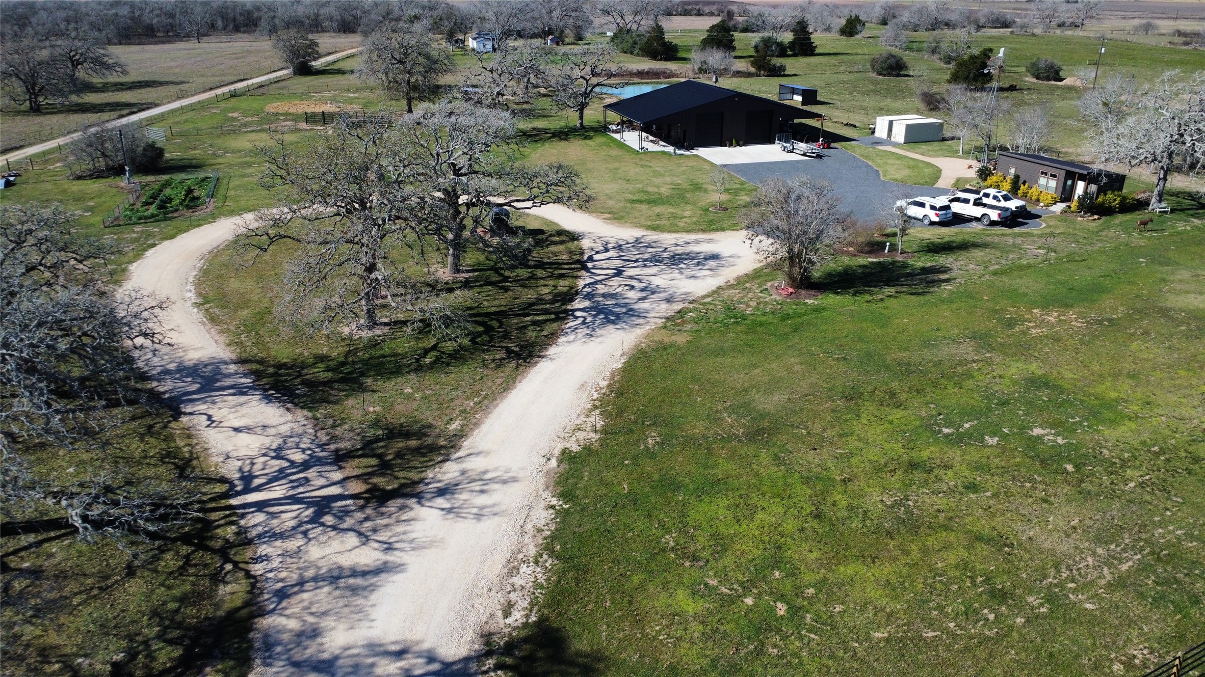 a view of a lake with a yard