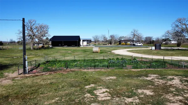 a view of a golf course with a lake