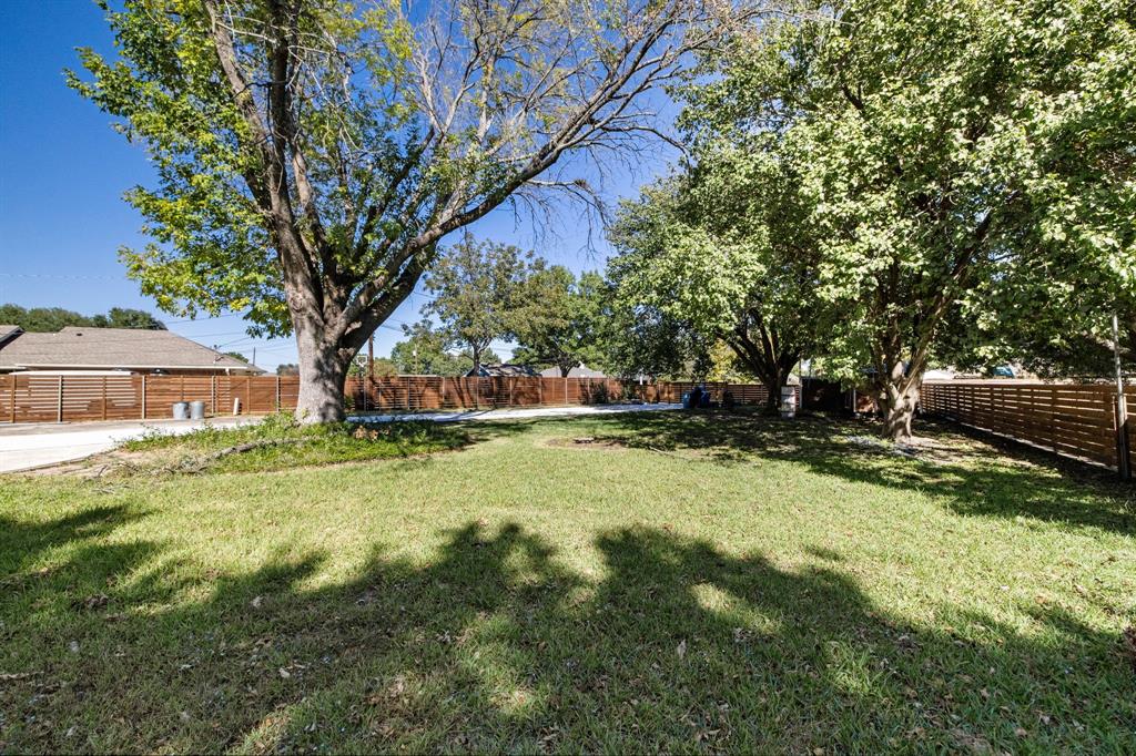 212 Magic Lane Sunnyvale, TX 75182 - Photo 20 of 22 a view of backyard with green space