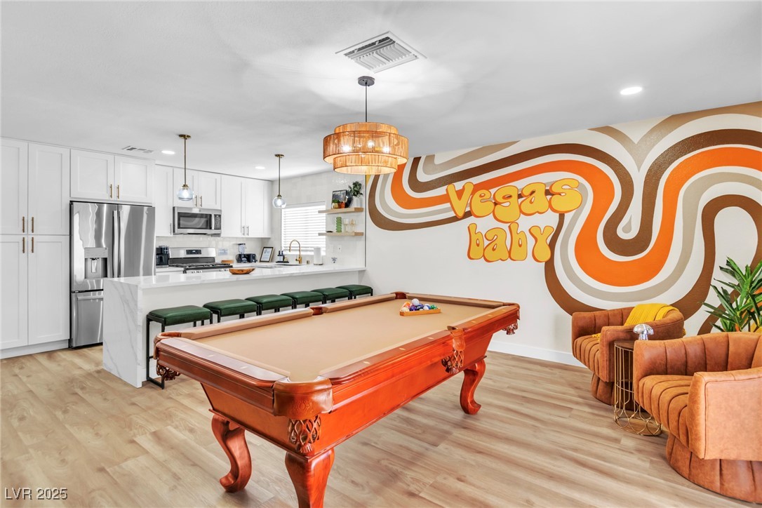 425 Golden Valley Drive Henderson, NV 89002 - Photo 12 of 48 Rec room featuring light wood-style floors, recess