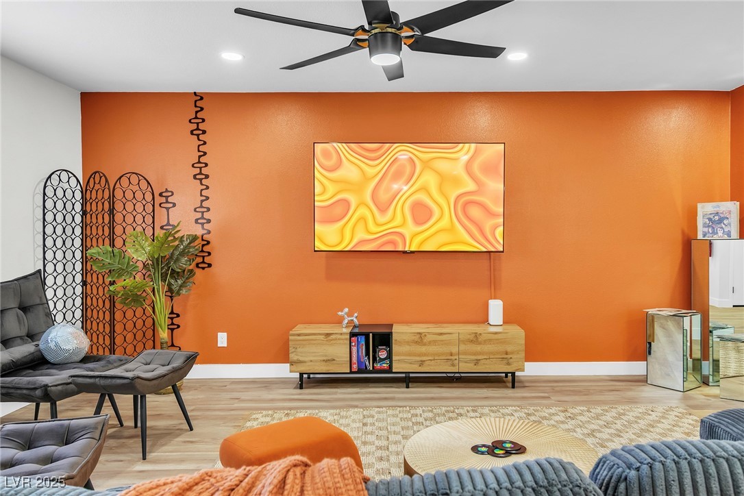 425 Golden Valley Drive Henderson, NV 89002 - Photo 18 of 48 Living room with wood finished floors, a ceiling f