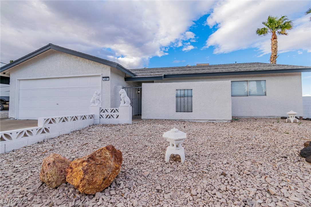 425 Golden Valley Drive Henderson, NV 89002 - Photo 3 of 48 Ranch-style house with stucco siding and an attach