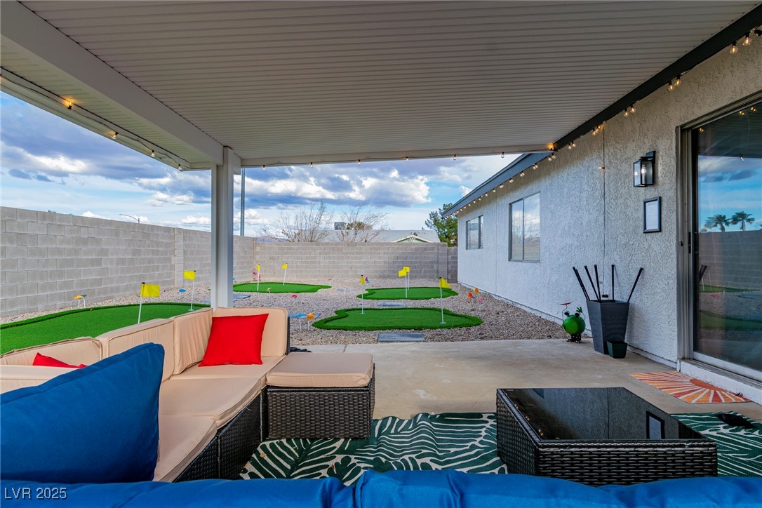 425 Golden Valley Drive Henderson, NV 89002 - Photo 39 of 48 Fenced backyard with an outdoor hangout area, a pa