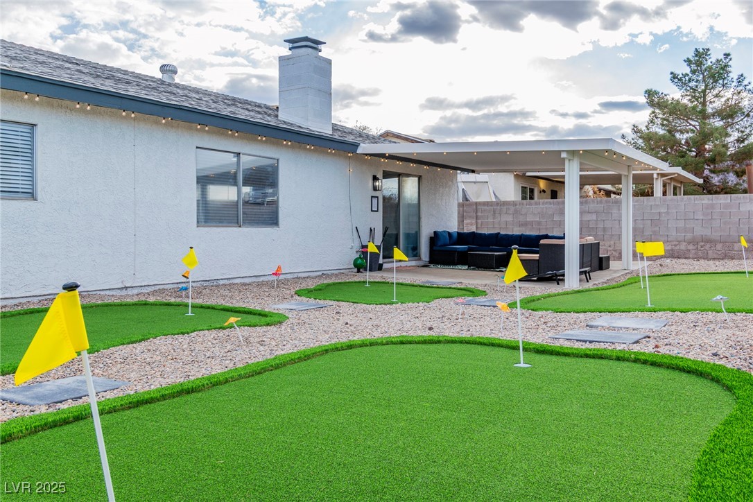 425 Golden Valley Drive Henderson, NV 89002 - Photo 42 of 48 Rear view of property featuring an area to practic