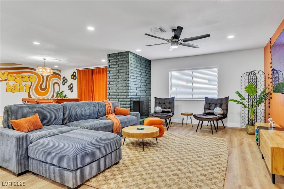 425 Golden Valley Drive Henderson, NV 89002 - Photo 7 of 48 Living room featuring recessed lighting, wood fini