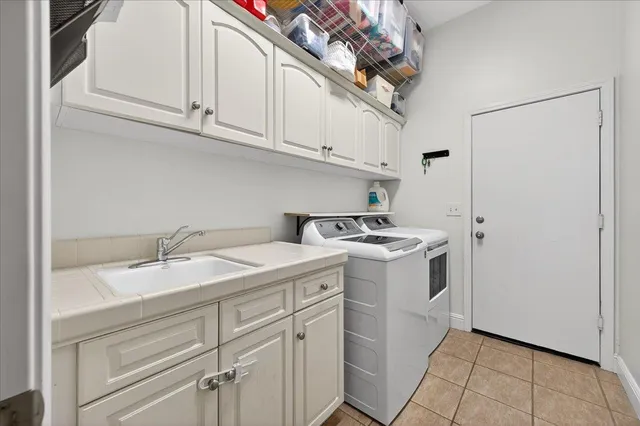 a utility room with cabinets