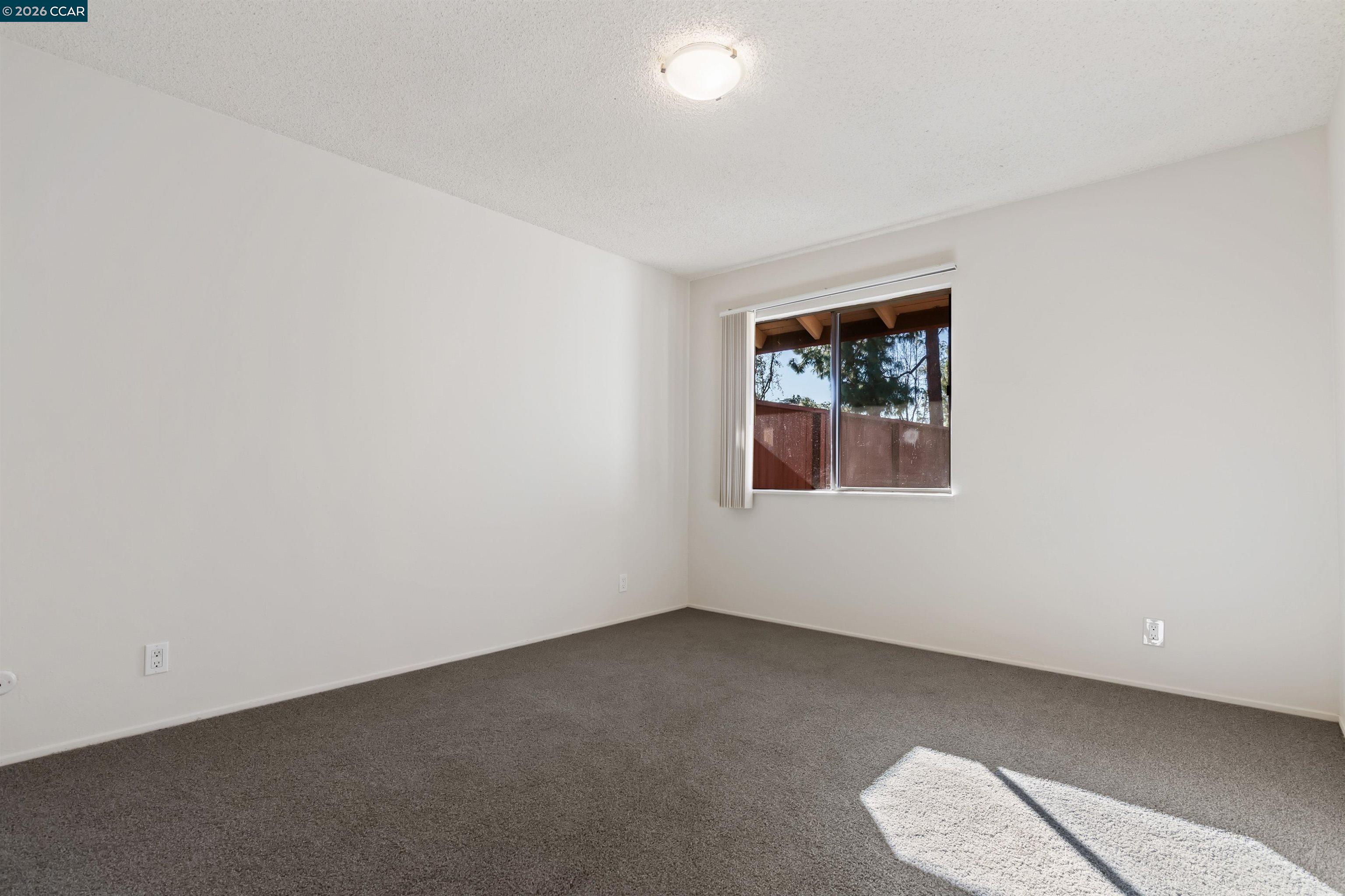 238-240 Camelback Road Pleasant Hill, CA 94523 - Photo 24 of 36 an empty room with windows