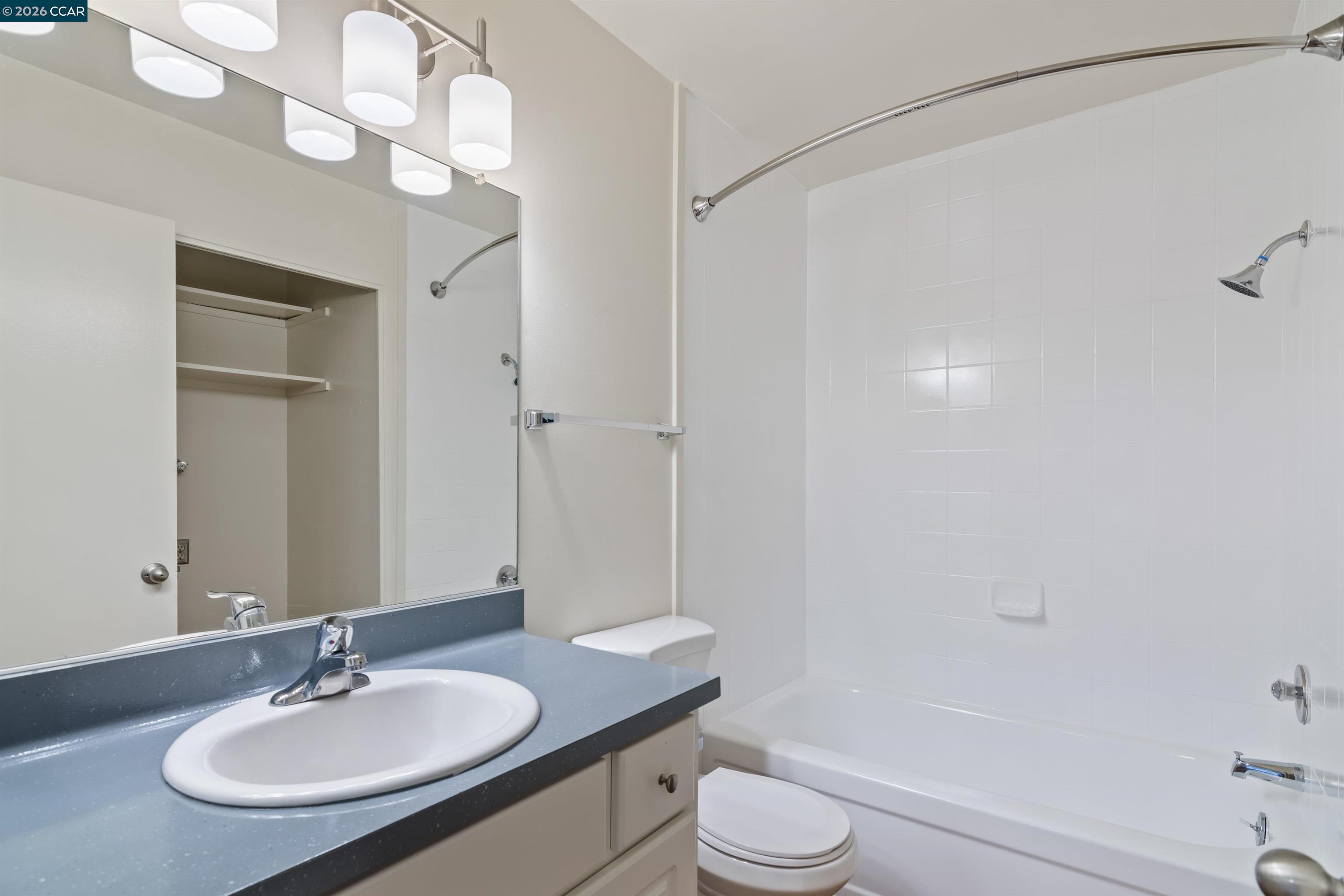 238-240 Camelback Road Pleasant Hill, CA 94523 - Photo 28 of 36 a bathroom with a sink a toilet and shower