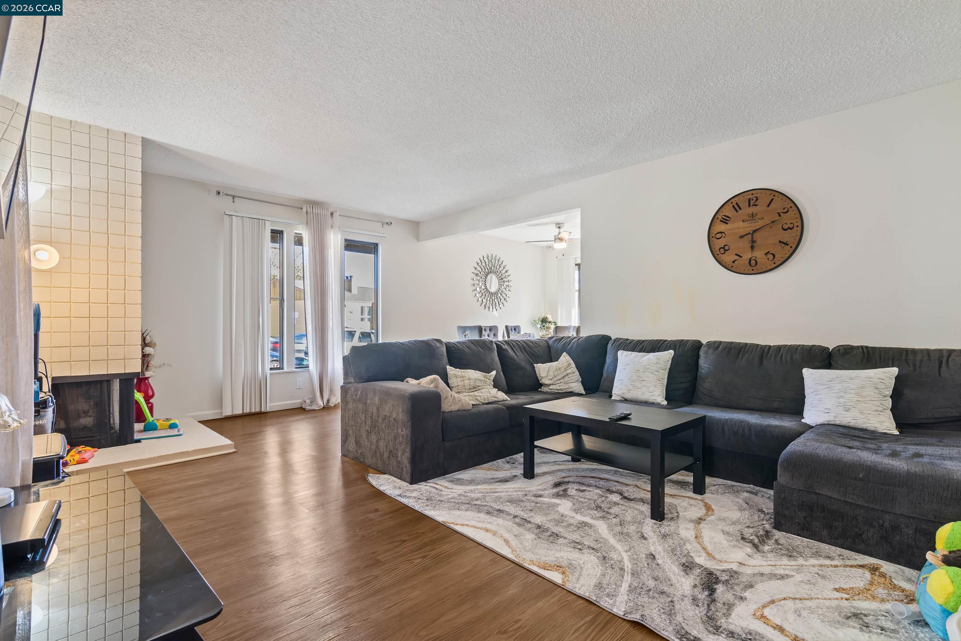 238-240 Camelback Road Pleasant Hill, CA 94523 - Photo 3 of 36 a living room with furniture and a wooden floor