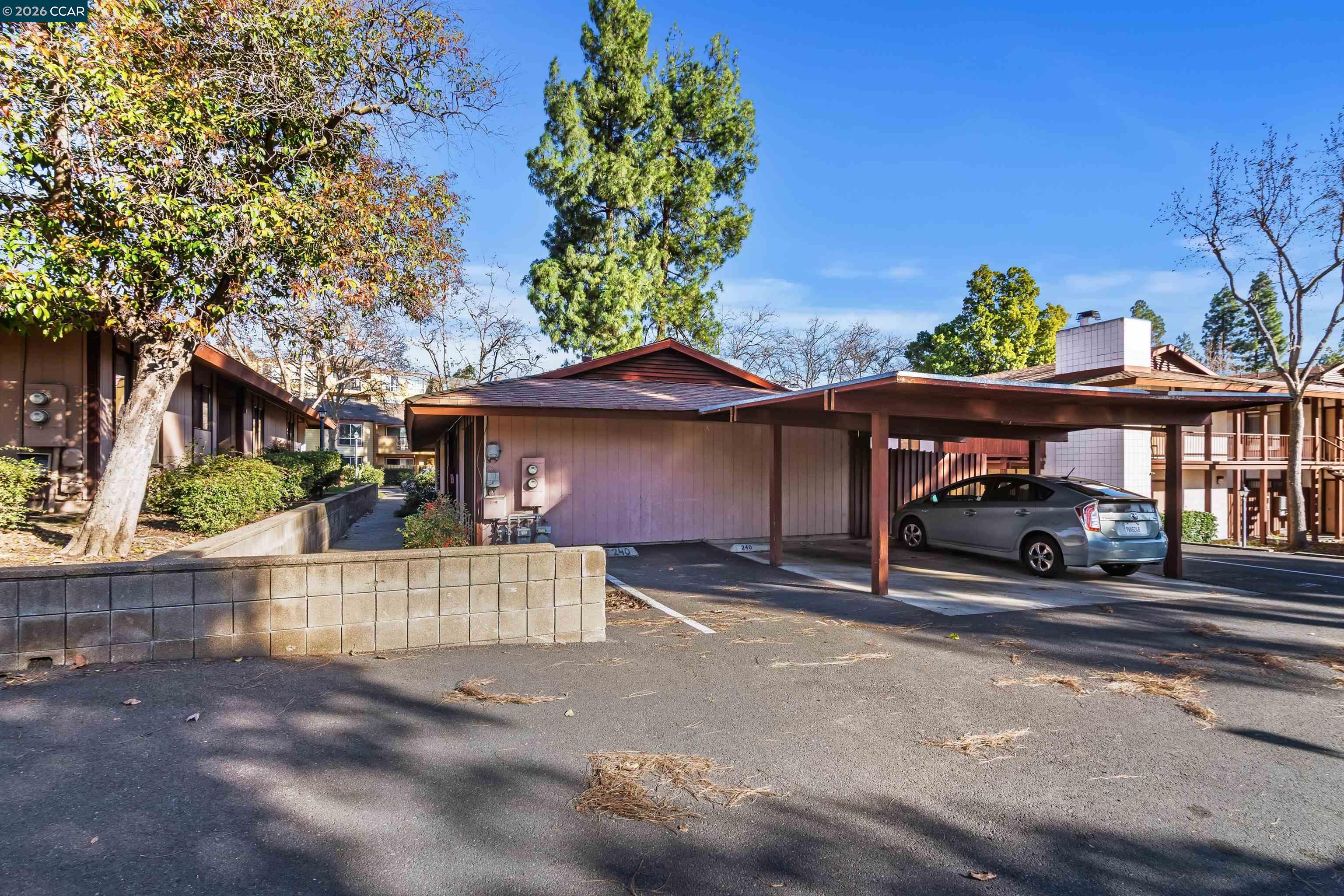 238-240 Camelback Road Pleasant Hill, CA 94523 - Photo 32 of 36 a front view of a house with a yard