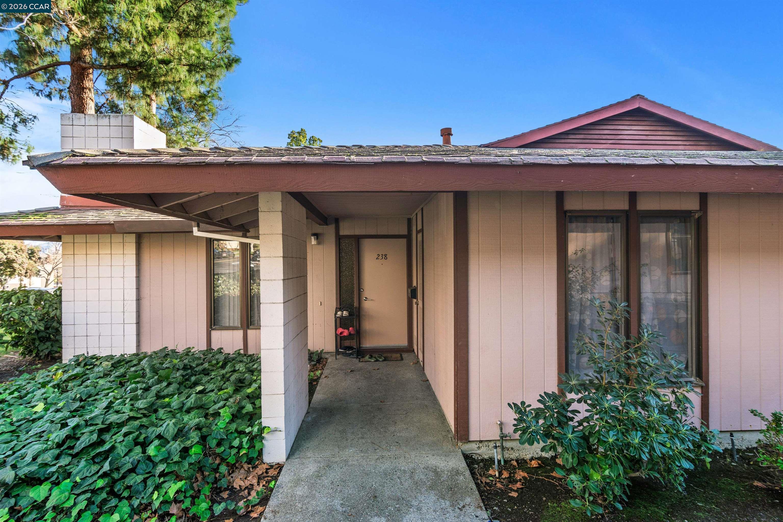 238-240 Camelback Road Pleasant Hill, CA 94523 - Photo 5 of 36 front view of a house with a yard