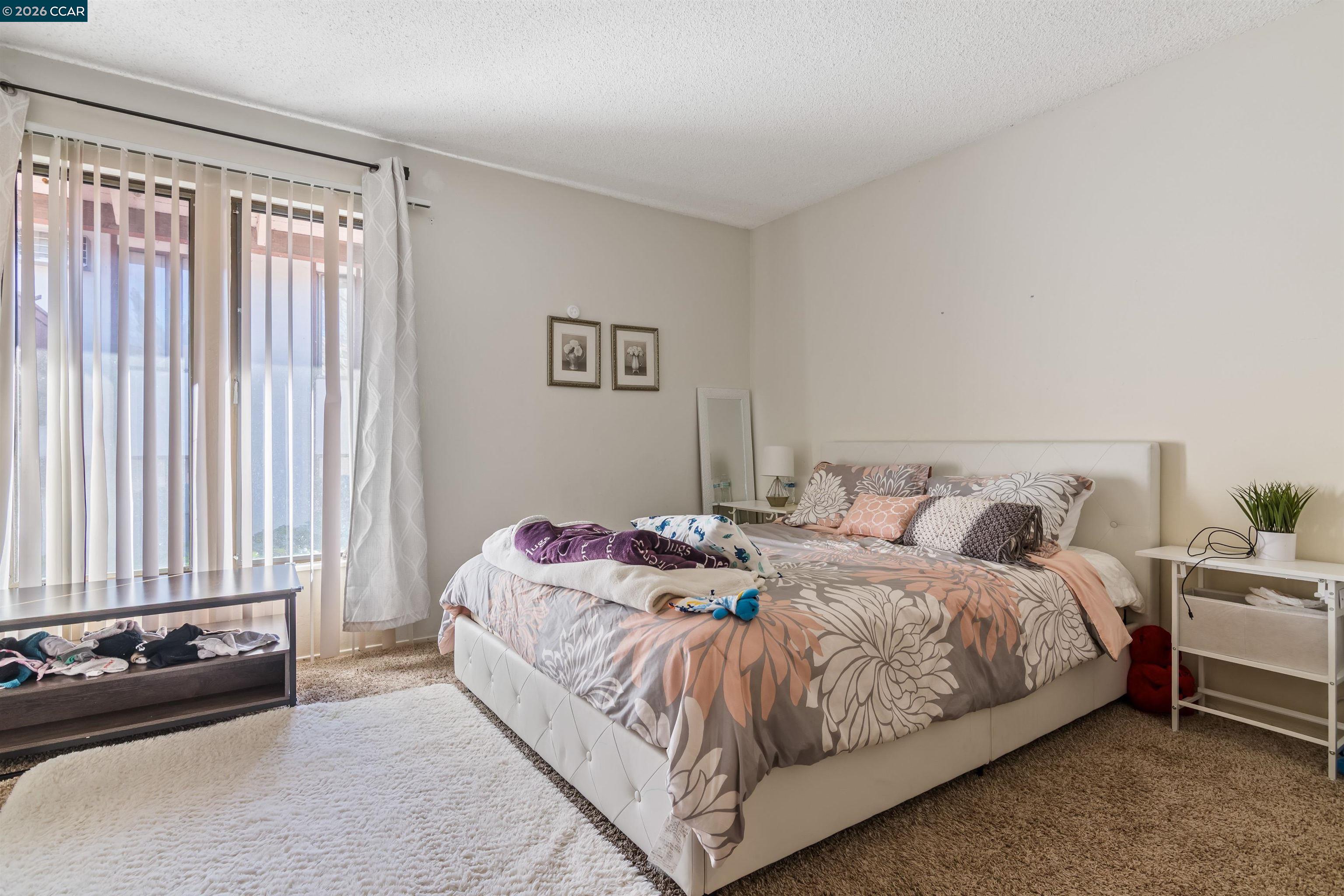 238-240 Camelback Road Pleasant Hill, CA 94523 - Photo 10 of 36 a bedroom with a bed and a couch