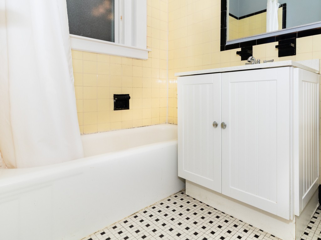 38 Kilsyth Road, Unit 22 Brookline, MA 02445 - Photo 15 of 18 a bathroom with a bathtub and a shower