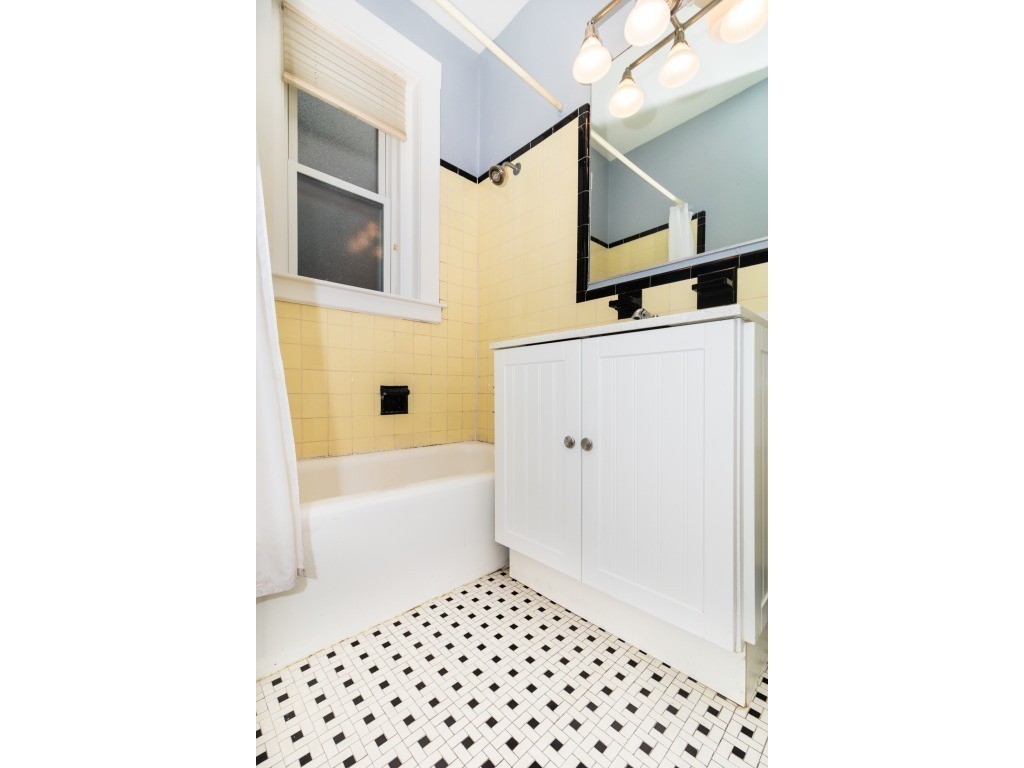 38 Kilsyth Road, Unit 22 Brookline, MA 02445 - Photo 16 of 18 a bathroom with a bathtub and a shower
