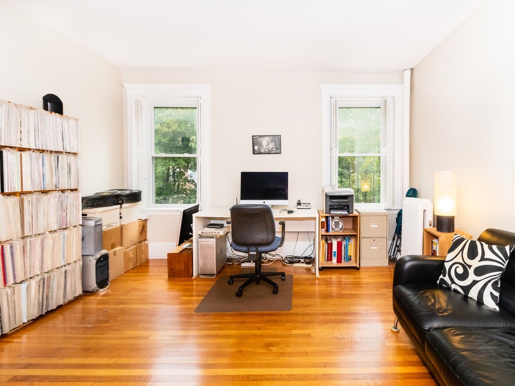 38 Kilsyth Road, Unit 22 Brookline, MA 02445 - Photo 6 of 18 a view of a livingroom with workspace and a window