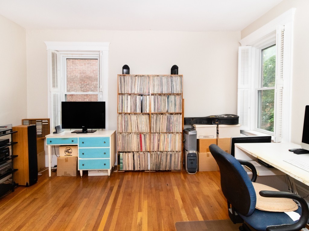 38 Kilsyth Road, Unit 22 Brookline, MA 02445 - Photo 8 of 18 a view of a workspace with furniture and a window
