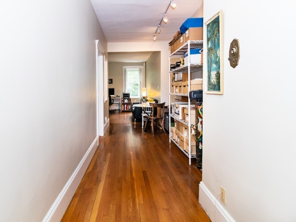 38 Kilsyth Road, Unit 22 Brookline, MA 02445 - Photo 9 of 18 a dining room with furniture and wooden floor