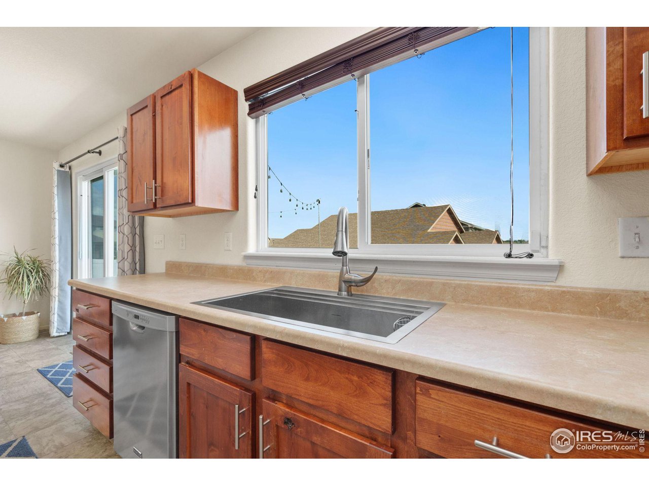 7808 West 11th St Road Greeley, CO 80634 - Photo 12 of 25 View of the backyard from the sink