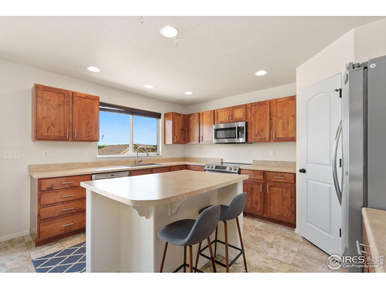 7808 West 11th St Road Greeley, CO 80634 - Photo 8 of 25 Breakfast bar and pantry