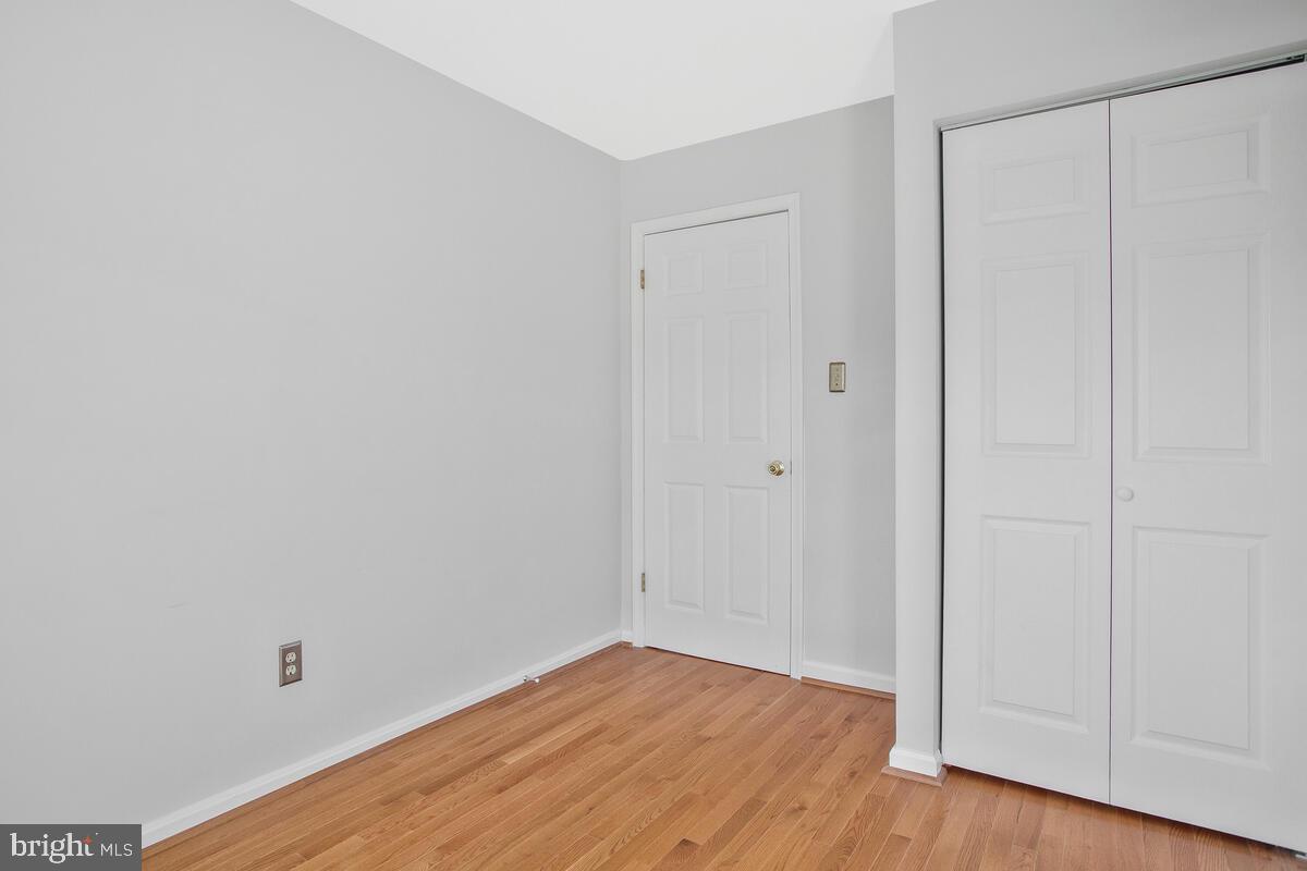 4 Offspring Court Perry Hall, MD 21128 - Photo 20 of 38 a view of an empty room with wooden floor