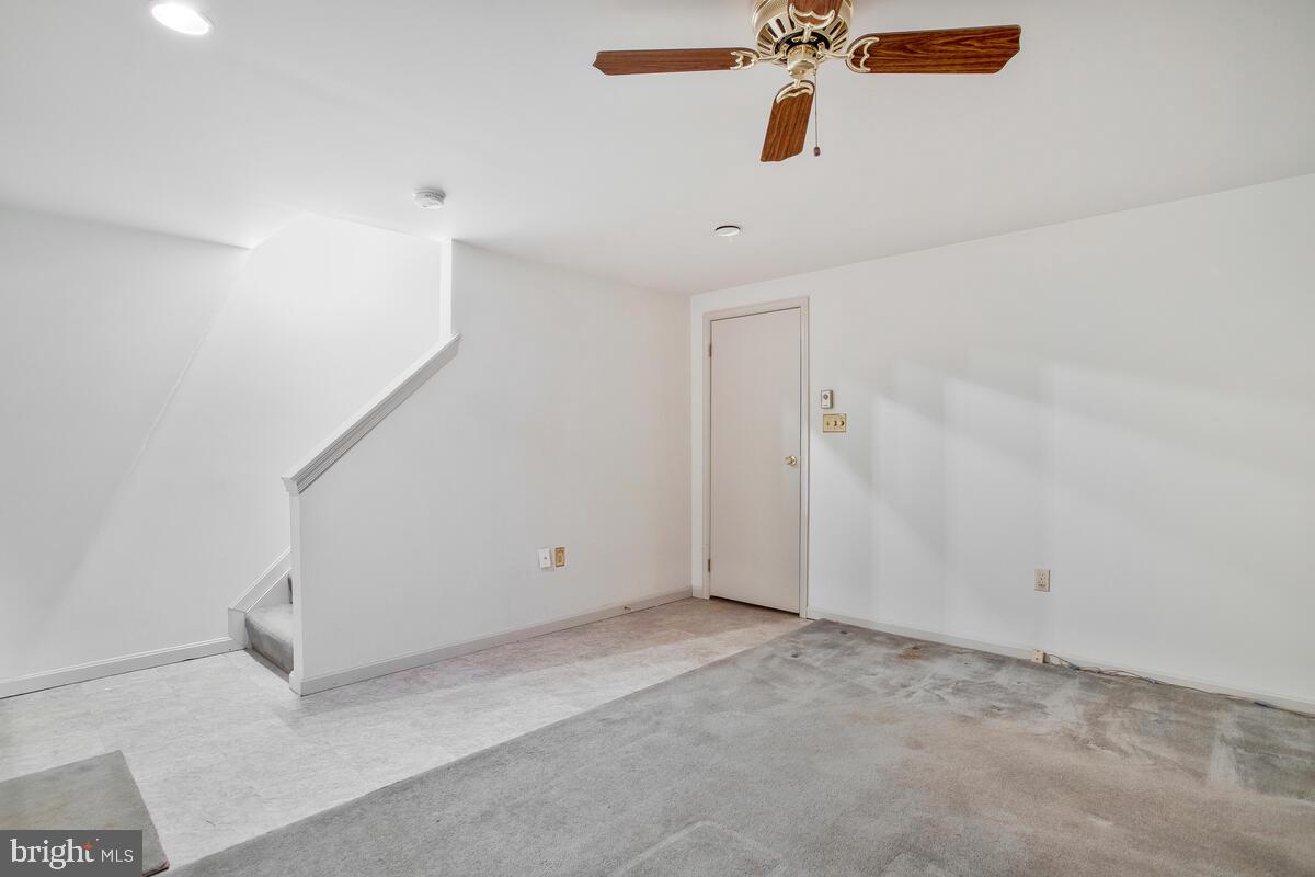4 Offspring Court Perry Hall, MD 21128 - Photo 25 of 38 an empty room with chandelier fan