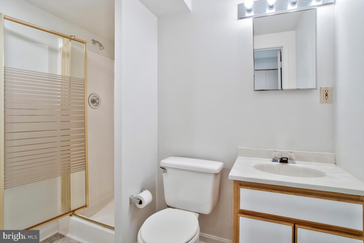 4 Offspring Court Perry Hall, MD 21128 - Photo 26 of 38 a bathroom with a sink and a mirror