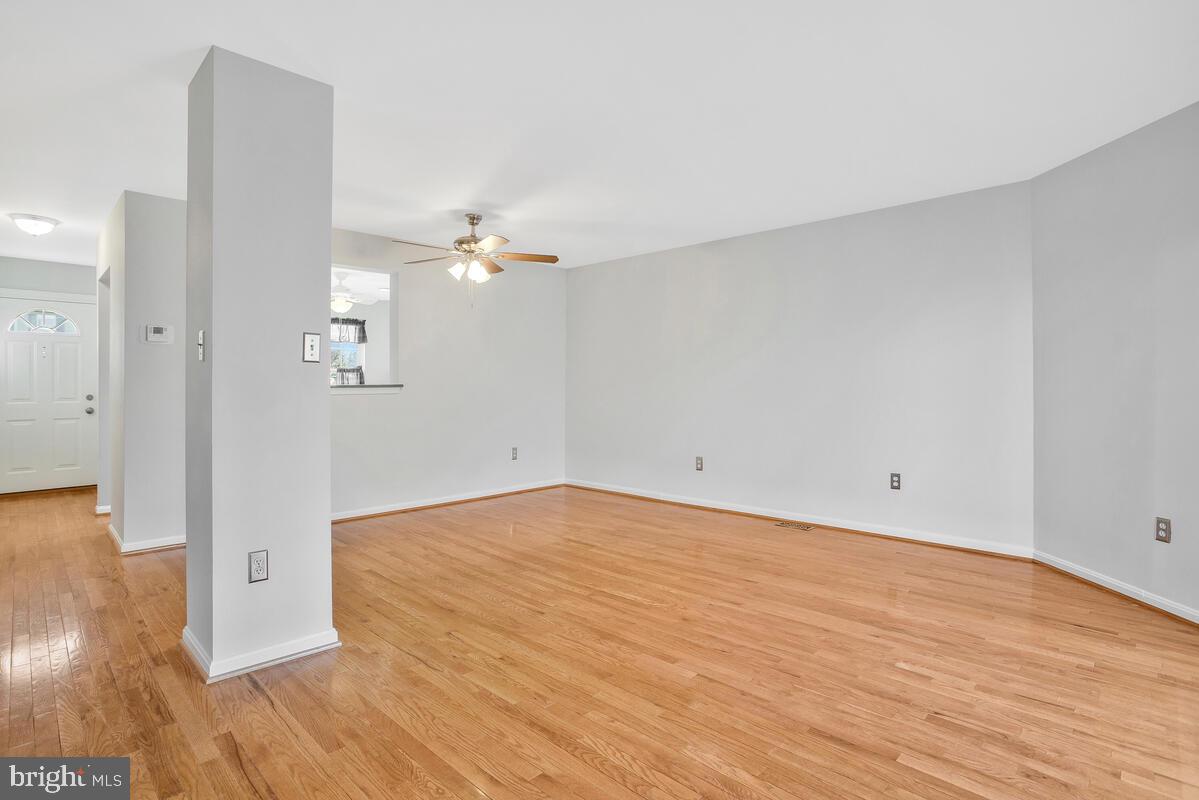 4 Offspring Court Perry Hall, MD 21128 - Photo 9 of 38 a view of a room with wooden floor