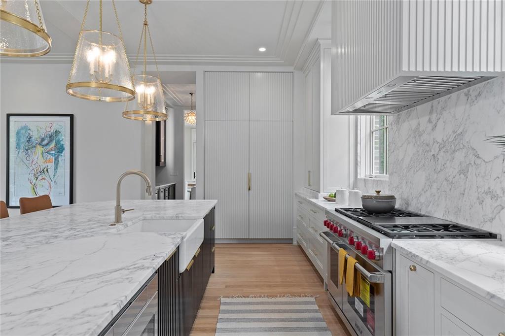 27 Maddox Drive Northeast Atlanta, GA 30309 - Photo 18 of 60 a kitchen with stainless steel appliances granite countertop a stove and a sink