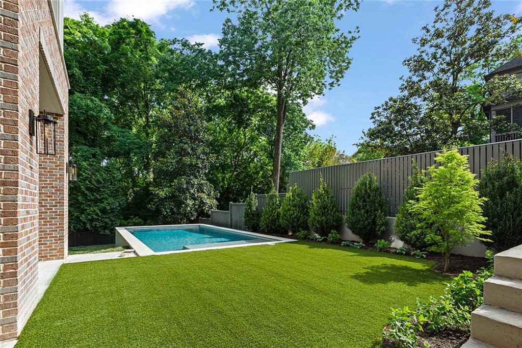 27 Maddox Drive Northeast Atlanta, GA 30309 - Photo 57 of 60 a view of a backyard with swimming pool