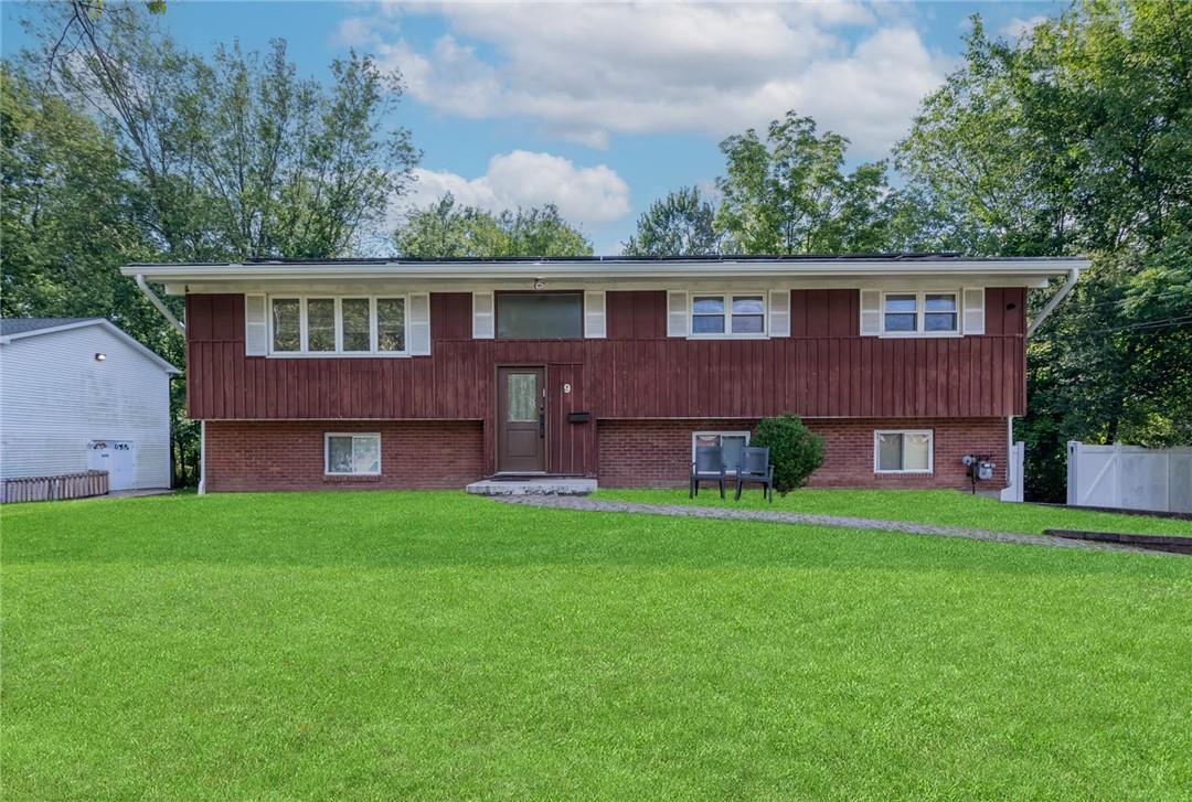 9 Brockton Road Spring Valley, NY 10977 - Photo 1 of 1 View of front of home featuring a front yard
