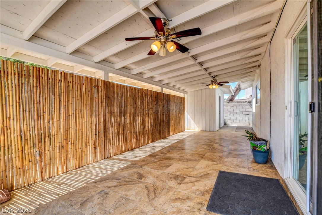 4367 South Mojave Road Las Vegas, NV 89121 - Photo 42 of 53 An inviting covered patio featuring tiled flooring and overhead cooling for outdoor comfort.