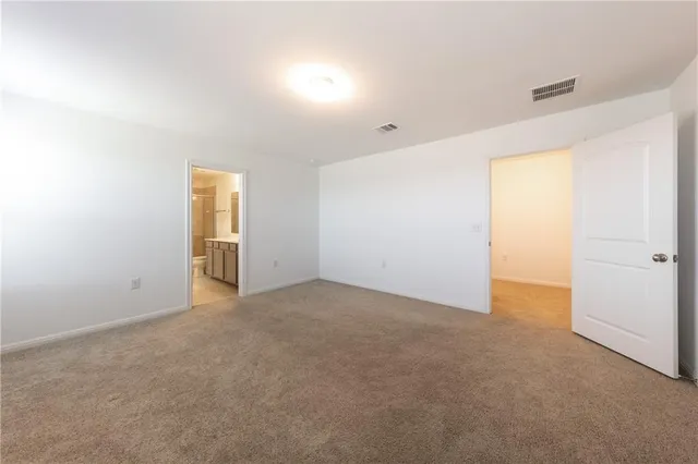 an empty room with an entryway