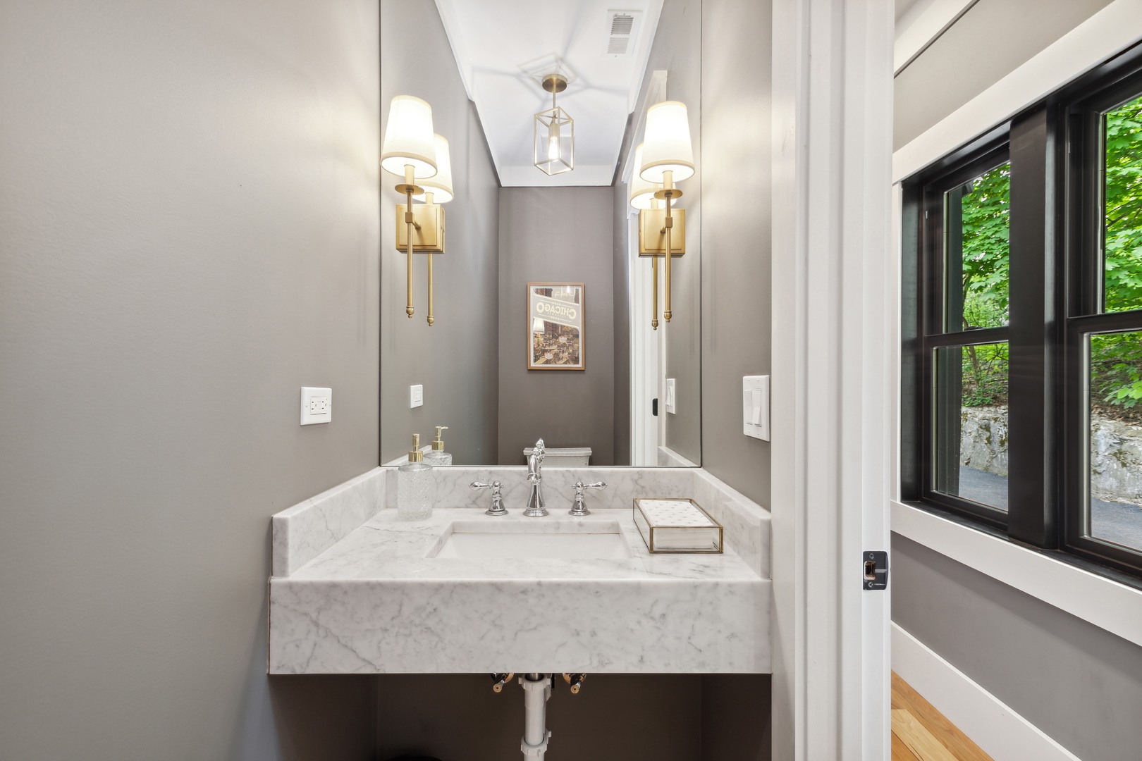112 Beachway Drive Fox River Grove, IL 60021 - Photo 12 of 37 a bathroom with a sink and a mirror