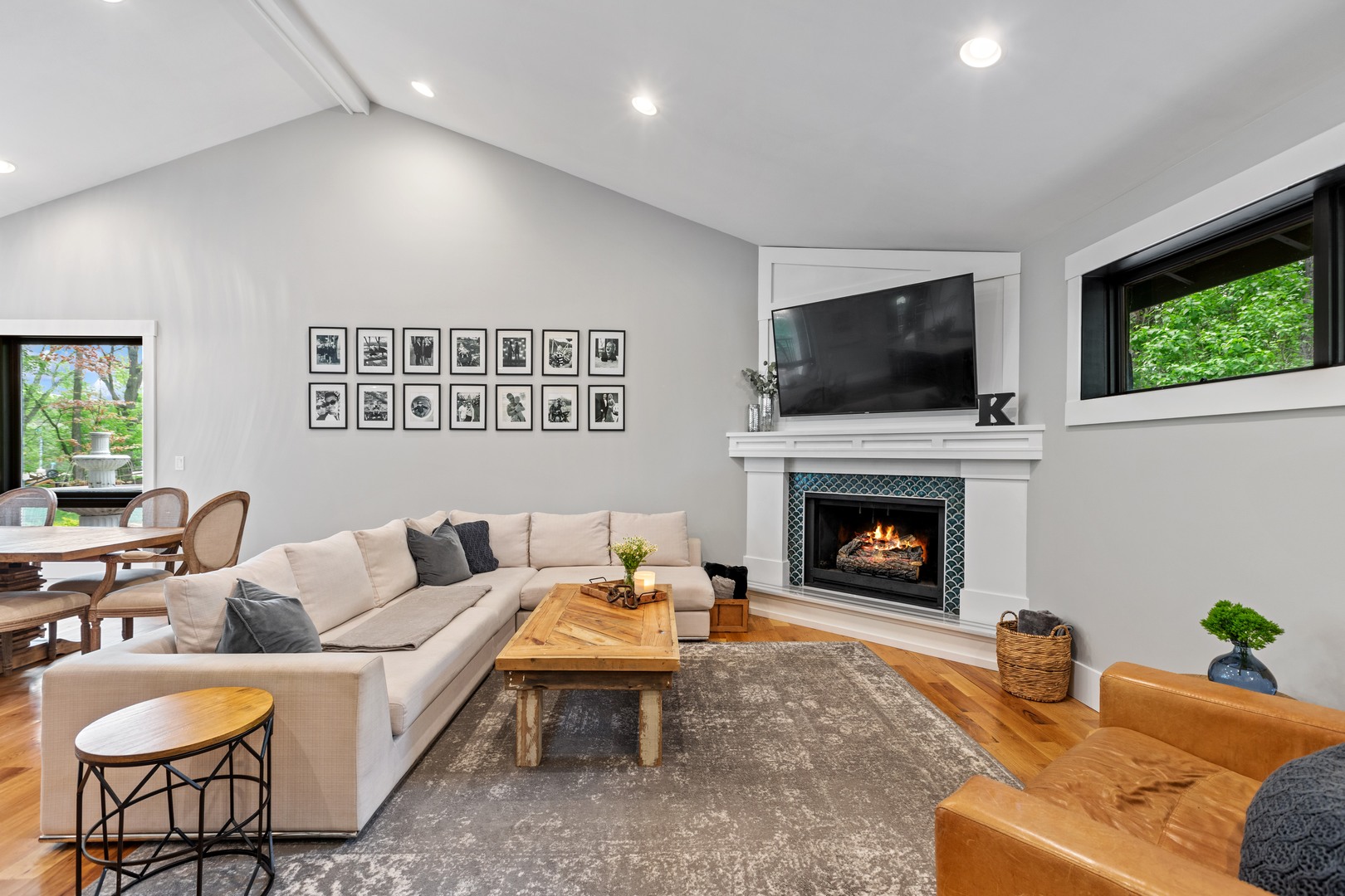 112 Beachway Drive Fox River Grove, IL 60021 - Photo 15 of 37 a living room with furniture a flat screen tv and a fireplace