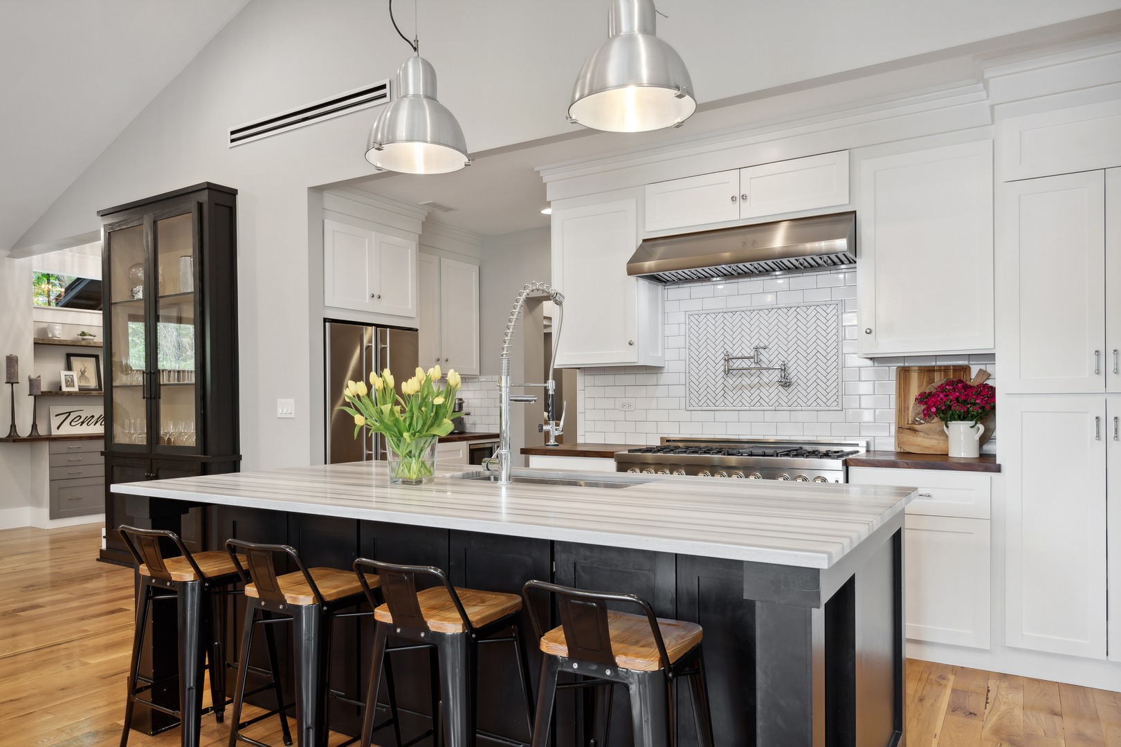 112 Beachway Drive Fox River Grove, IL 60021 - Photo 18 of 37 a kitchen with granite countertop a table chairs stove and cabinets