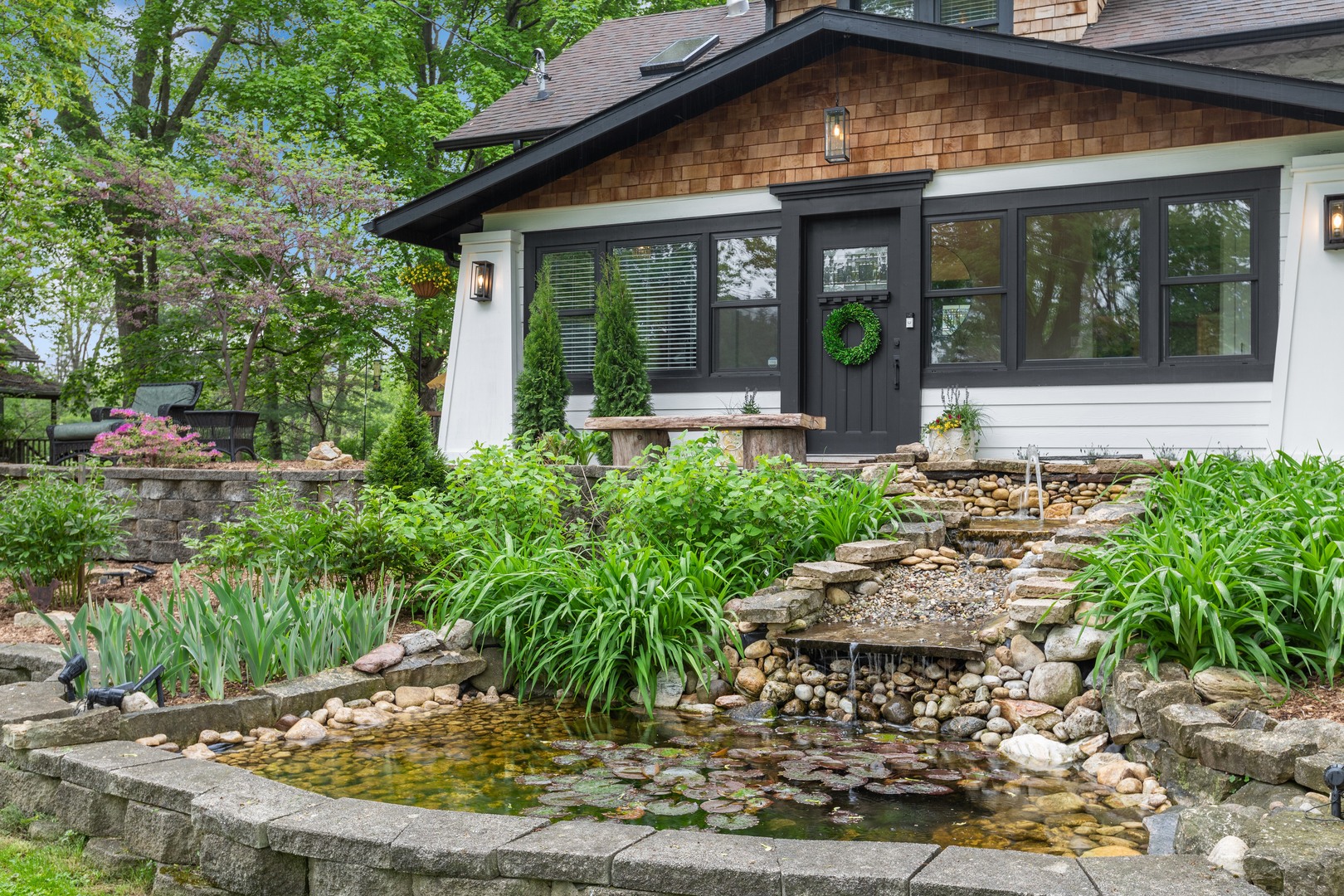 112 Beachway Drive Fox River Grove, IL 60021 - Photo 2 of 37 a view of a house with a small yard plants and large tree