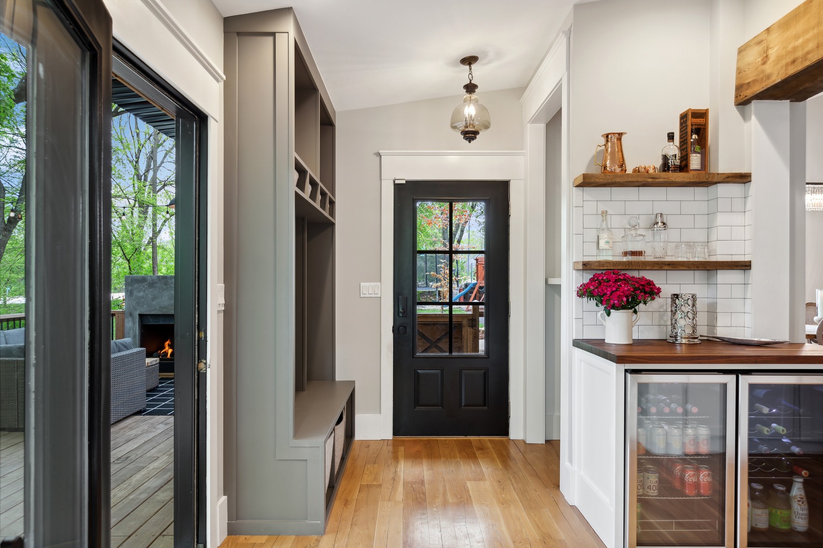 112 Beachway Drive Fox River Grove, IL 60021 - Photo 22 of 37 a view of hallway with wooden floor and chandelier