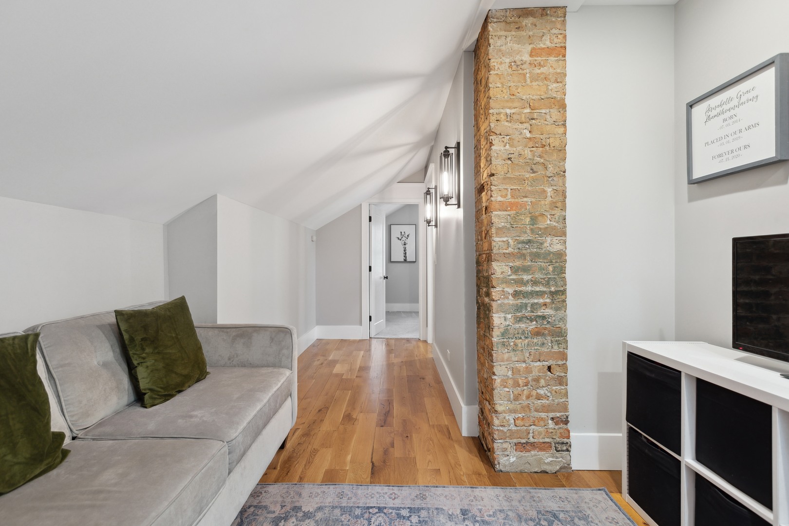 112 Beachway Drive Fox River Grove, IL 60021 - Photo 27 of 37 a living room with furniture and a flat screen tv