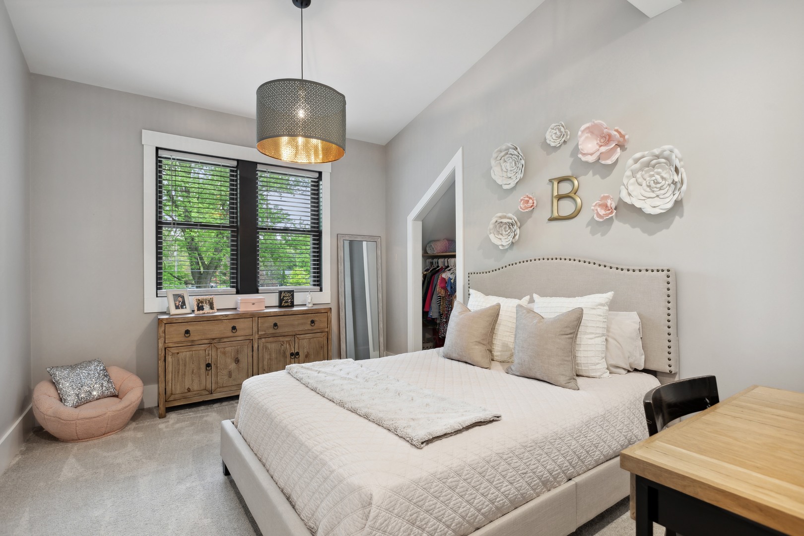 112 Beachway Drive Fox River Grove, IL 60021 - Photo 29 of 37 a bedroom with a bed and a chandelier