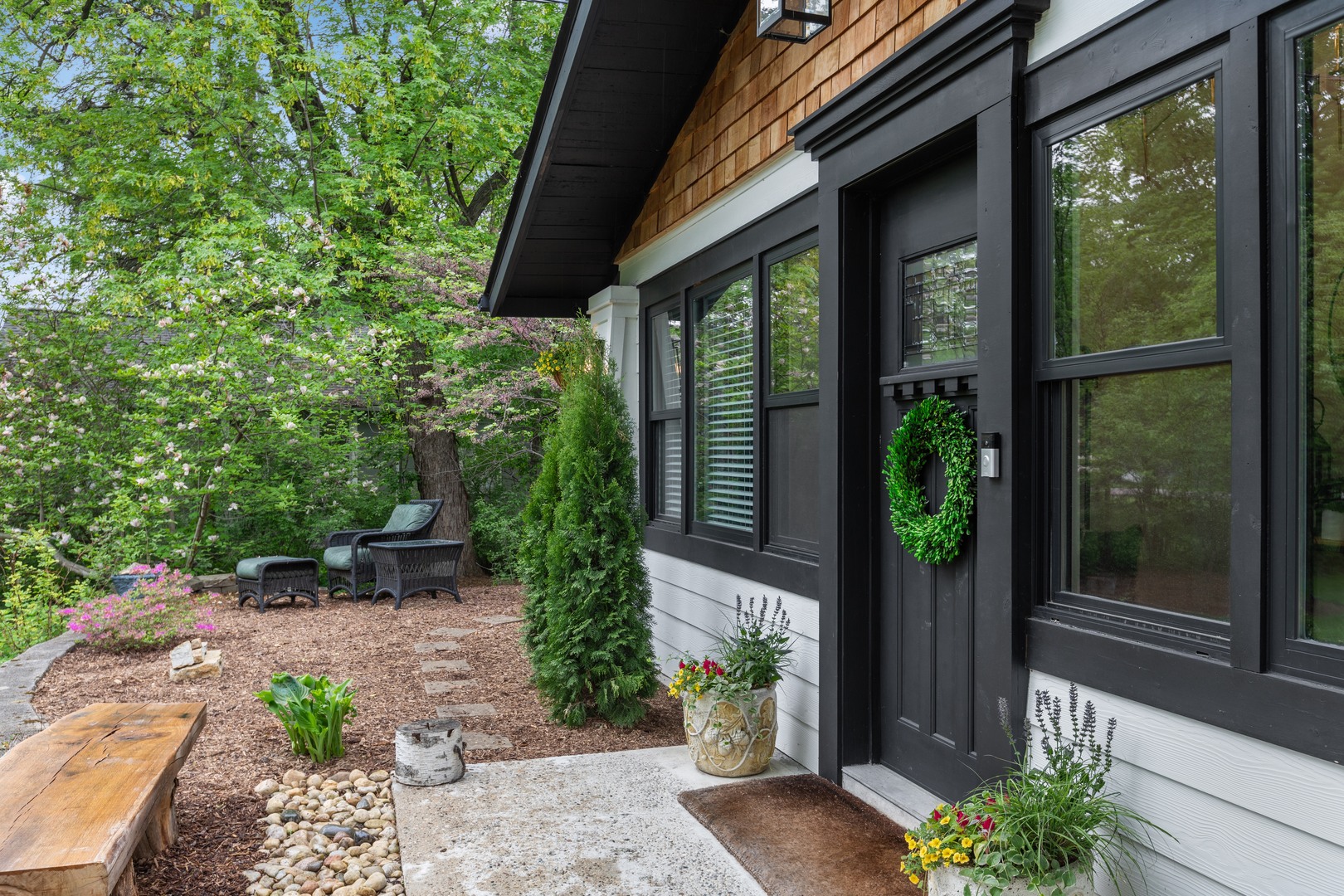 112 Beachway Drive Fox River Grove, IL 60021 - Photo 4 of 37 a view of a patio with table and chairs and potted plants